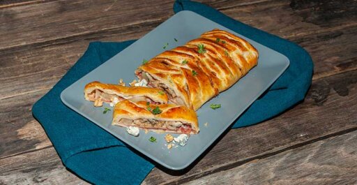 Puff Pastry Braid Stuffed with Spicy Gorgonzola PDO, Dried Fruit, Pears and Bacon